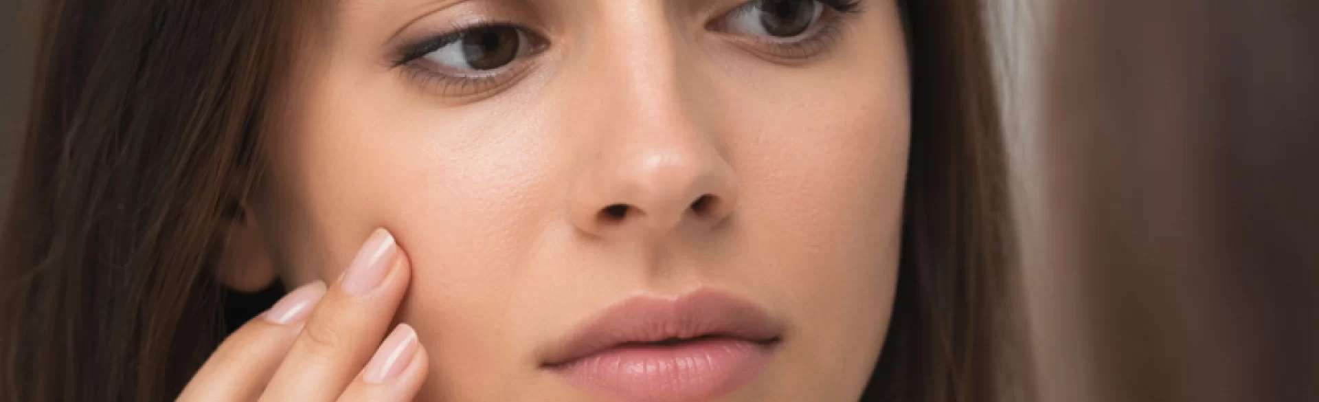 Pimples between the eyebrows